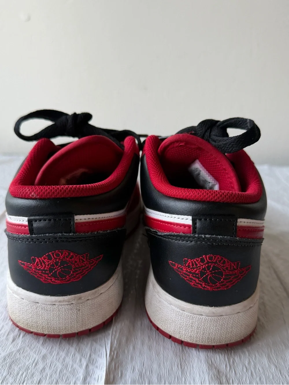 Jordan Men’s Low-Top Sneakers in Red, White & Black